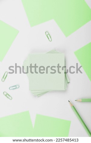 Multiple Assorted Collection Office Stationery Photo With Pens Pencils Notepads Notebook Ruler Stapler Scissors Clippers Paper Clips Holders Clipboard Placed Over Table.