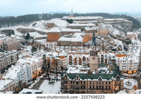 Top view of snowy white fortress, winter landscape in Klodzko city, Poland
