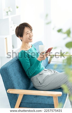 Asian woman using a smartphone