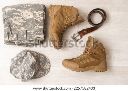 military camouflage uniforms and boots