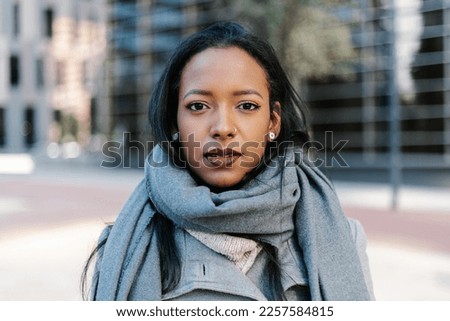 Portrait of successful young latin american business woman standing outdoor at corporate office Royalty-Free Stock Photo #2257584815