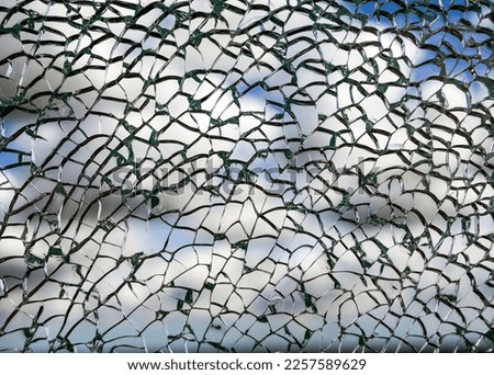 Useful texture overlay. A broken glass on. with many sharp shards. Useful texture overlay for background. 