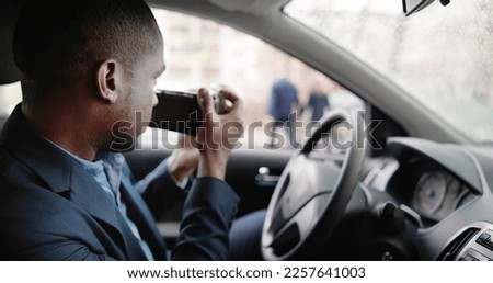 Private Detective Spying On Cheating Woman Wife Royalty-Free Stock Photo #2257641003