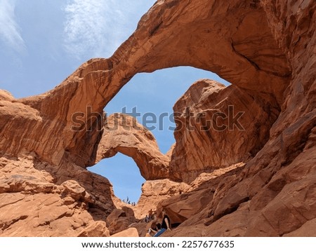 Scenic view of Double Arch red rock formation at Arches National Park in Moab, Utah. Tourist attraction. Royalty-Free Stock Photo #2257677635