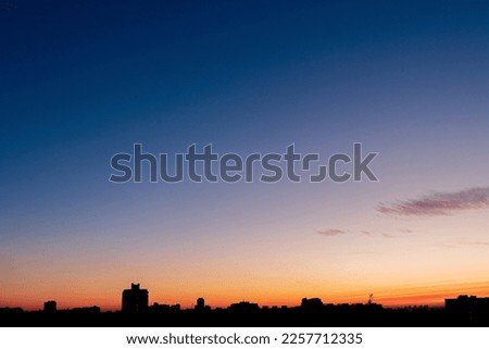 sunset over city, beautiful landscape Royalty-Free Stock Photo #2257712335
