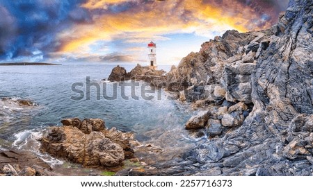 Fabulous view of sunrise over Capo Ferro Lighthouse. Popular travel destination of Mediterranean sea. Location: Porto Cervo, Province of Sassari, Sardinia, Italy, Europe Royalty-Free Stock Photo #2257716373