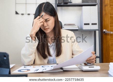 Tired teen girl rubbing dry irritable eyes feel eye strain tension migraine after computer work, exhausted young Asian woman student relieving headache pain, bad weak blurry vision, eyesight problem Royalty-Free Stock Photo #2257718635