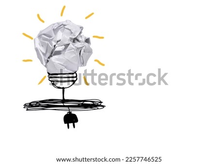 Sun drawn using crumpled paper ball (bulb). Light bulb idea from white paper ball on white background, creative idea and innovation idea concept. Solar energy design, plug, cable. Copy space. Nobody