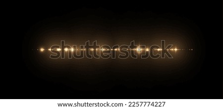 Abstract stylish golden light effect on black background. Gold glowing shimmering lines. Golden glowing dust and glare. Flash Light. Light trail. Vector illustration. EPS 10 Royalty-Free Stock Photo #2257774227
