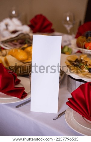 White table paper plaques on the table cafe