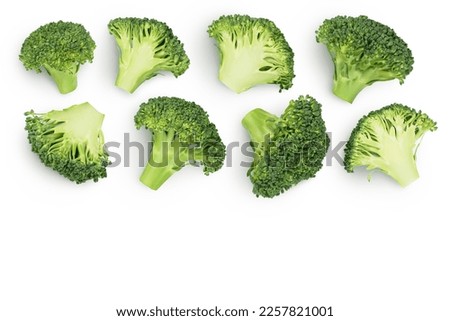 fresh broccoli isolated on white background close-up with full depth of field. Top view with copy space for your text. Flat lay Royalty-Free Stock Photo #2257821001