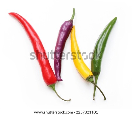 Letter W made from red green purple and yellow chili peppers
alphabetic ABC letters made of chillies, peppers,  for texts, , encyclopedias and artificial words related to vegan or a vegan January
 Royalty-Free Stock Photo #2257821101