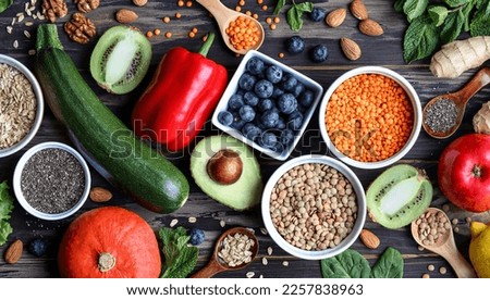 Functional food, fruits, vegetables, cereals, seeds, nuts, herbs. Healthy food every day. Royalty-Free Stock Photo #2257838963