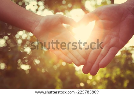 Father with child holding hands.  Instagram effect. Royalty-Free Stock Photo #225785809