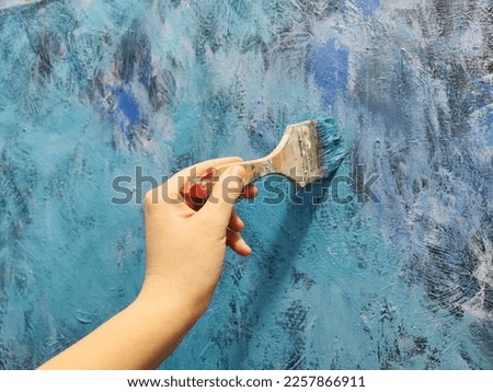 Painting an abstract picture, background, texture, brush