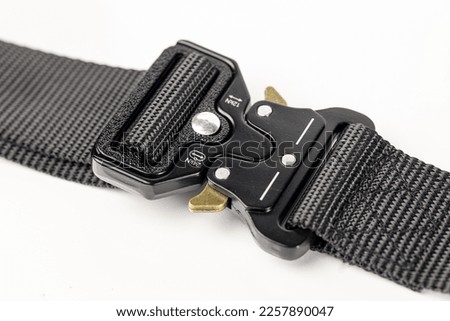 iron black climber belt buckle on white isolated background Royalty-Free Stock Photo #2257890047