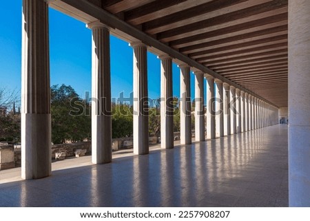 Stoa of Attalos, in the Agora of Athens, Greece. It was built by King Attalos II of Pergamon, typical of hellenistic age under the rock of Acropolis. Royalty-Free Stock Photo #2257908207
