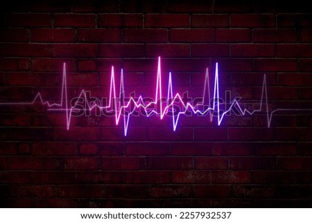 Heart rate on the background of an old brick wall. Life line. Health concept. Neon cardiogram pink with blue. Love. Beating in unison. Royalty-Free Stock Photo #2257932537