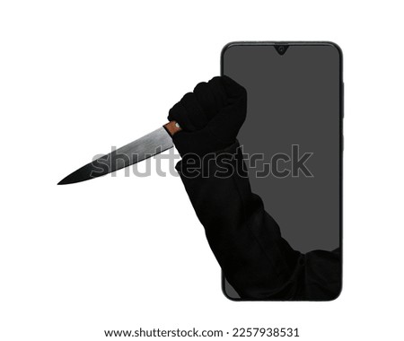 A picture of suspicious hand holding a knife on appear on smartphone. Beware of hacker and fraud call.