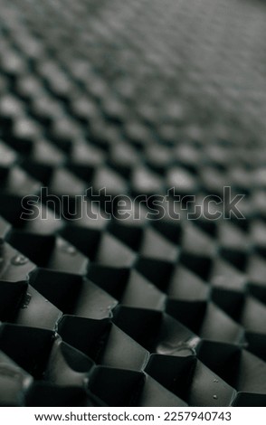 Pattern from a cooling tower fill.  Royalty-Free Stock Photo #2257940743