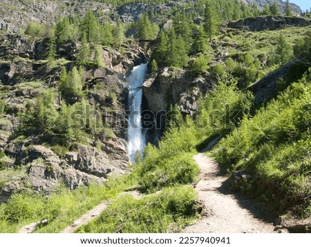 Lillaz waterfalls - Cogne - Aosta Valley. Alps, Italy. Royalty-Free Stock Photo #2257940941