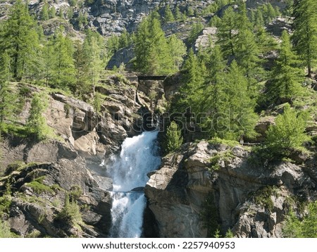 Lillaz waterfalls - Cogne - Aosta Valley. Alps, Italy. Royalty-Free Stock Photo #2257940953