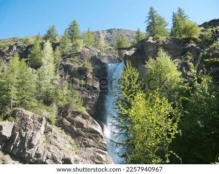 Lillaz waterfalls - Cogne - Aosta Valley. Alps, Italy. Royalty-Free Stock Photo #2257940967