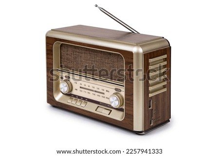Portable retro radio isolated on white background, devices which are popular in the past for music and news Royalty-Free Stock Photo #2257941333
