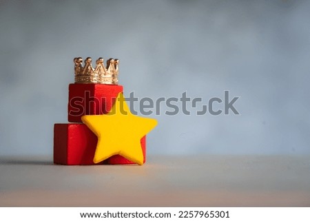Hierarchy, power, management and leadership concept. Being unique and the best. Domination, victory and winning the challenge. Beat competitors. One different on better, higher level. crown and star
