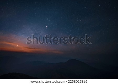 Milky way over locating on mountain view between the hiking route to Doi pui ko, Mae hong son, Thailand. Royalty-Free Stock Photo #2258013865