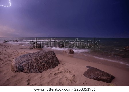 thunderstorm with lightning on the sea night