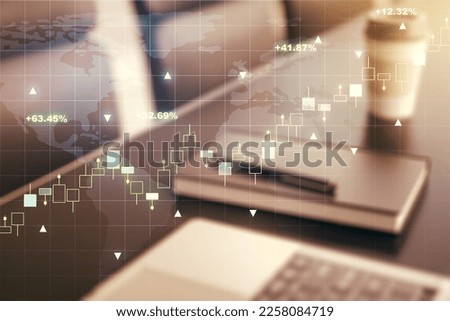 Abstract creative financial graph with world map on modern computer background, financial and trading concept. Multiexposure