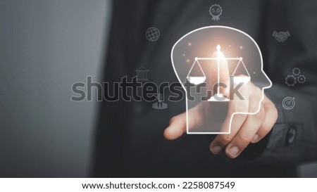 Business ethics Behavior and manners concept.  Businessman touch on Ethics inside human mind integrity and moral symbols Company ethics culture, ESG. Royalty-Free Stock Photo #2258087549