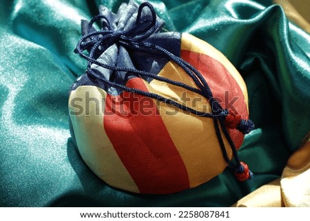 It is a lucky bag made of fabric that makes hanbok, and it is traditionally a bag that can hold blessings when attached to New Year's Day. Royalty-Free Stock Photo #2258087841
