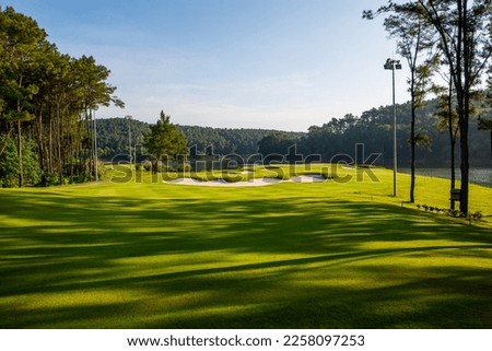 Beautiful Golf Courses landscape on sunny day, shadow of the trees, beautiful golf background 