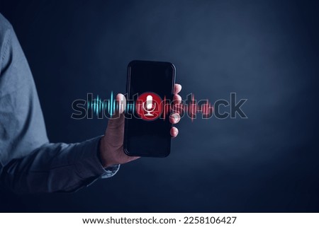 Businessman voice recording the conversation via smartphone with customers, telemarketing, consulting, voice assistance access to information and applications, write a message and send a message. Royalty-Free Stock Photo #2258106427