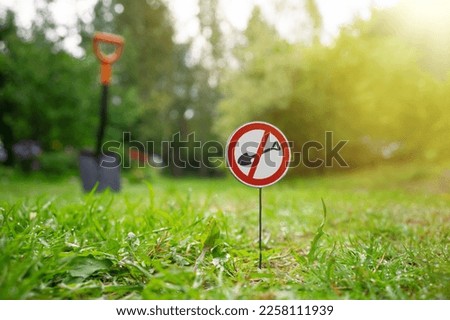 A round red sign forbidding digging in this place. Digging is forbidden. Royalty-Free Stock Photo #2258111939