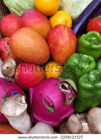 Fresh fruits.assorted vegetables and fruits background.