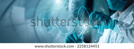 Scientists are experimenting Genetic research and Biotech science Human Biology and pharmaceutical technology on laboratory background. Medical science and biotechnology. Royalty-Free Stock Photo #2258124451