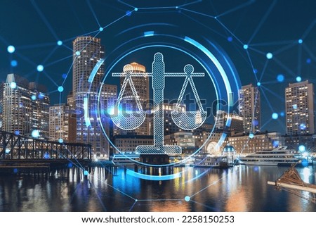 City view panorama of Boston Harbor and Seaport Blvd at night time, Massachusetts. Financial downtown. Glowing hologram legal icons. The concept of law, order, regulations and digital justice.
