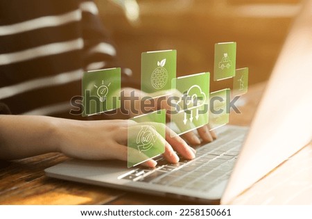 Reduce CO2 emissions concept. green business and development based on renewable energy. global warming, global climate change, Woman using laptop for working technology Net zero and Carbon neutrality, Royalty-Free Stock Photo #2258150661