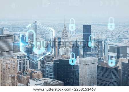 Aerial panoramic city view of Upper Manhattan area, the East Side, river and Brooklyn on horizon, New York city, USA The concept of cyber security to protect confidential information, padlock hologram