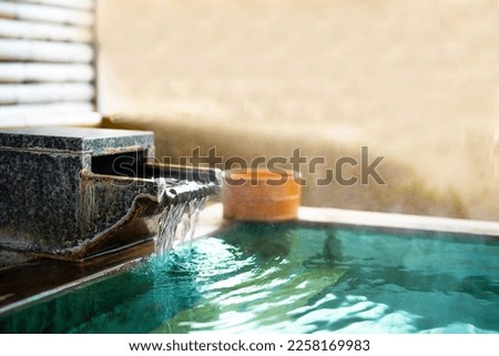 Japanese Hot Springs Onsen Natural Bath,  In the natural healing bamboo room, selective focus, soft focus. Royalty-Free Stock Photo #2258169983