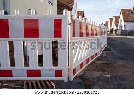 Mobile construction site barrier made of plastic on a street