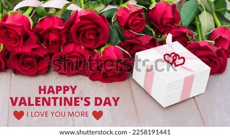 bouquet of red roses and gift boxes, symbolizing love and affection for Valentine's Day.