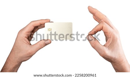 Bank credit plastic card mock-up in hand. Blank bankcard with chip, OK gesture sign isolated on white background. High quality photo