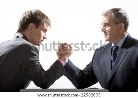 Portrait of two partners fighting and looking at each other