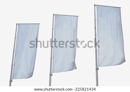 White banner. Tree empty vertical banners isolated. Blank space for write at your own. White flag isolated