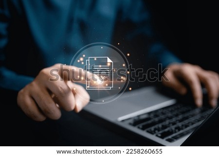 Business document icon. Business webinar document. Icon on laptop virtual screen hologram technology theme, business mail, official paper, attachment. business, laptop. Royalty-Free Stock Photo #2258260655