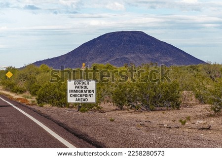 border patrol immigration checkpoint ahead sign in the Arizona desert near the Mexico border Royalty-Free Stock Photo #2258280573